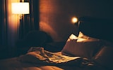 unmade bed in hotel room