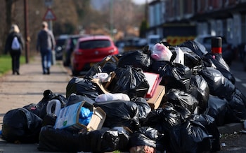 Piles of rubbish outside homes in Birmingham, Britain