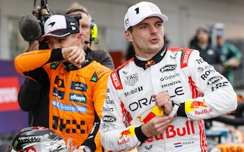 First-placed Red Bull driver Max Verstappen (right) and second-placed McLaren driver Lando Norris after the Japanese Grand Prix