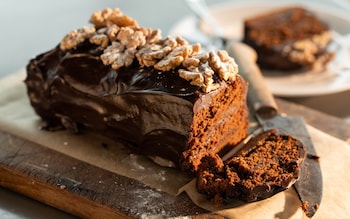 Plate with chocolate ganache loaf cake