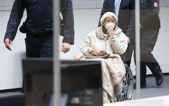 Defendant Irmgard F is brought to a courtroom in Itzehoe, northern Germany, for the verdict in 2022