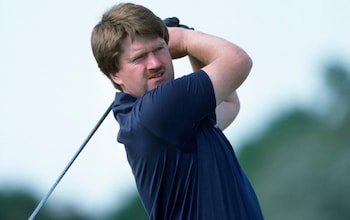 Peter McEvoy tees off during the Open Championship at St Andrews in 1984