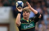 Henry Pollock imitates a basketball free-throw in celebration after scoring for Northampton